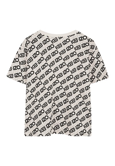T-shirt à manches courtes en beige clair avec un motif logo noir "KENZO" sur l'ensemble. Fabriqué en coton doux avec une coupe décontractée.