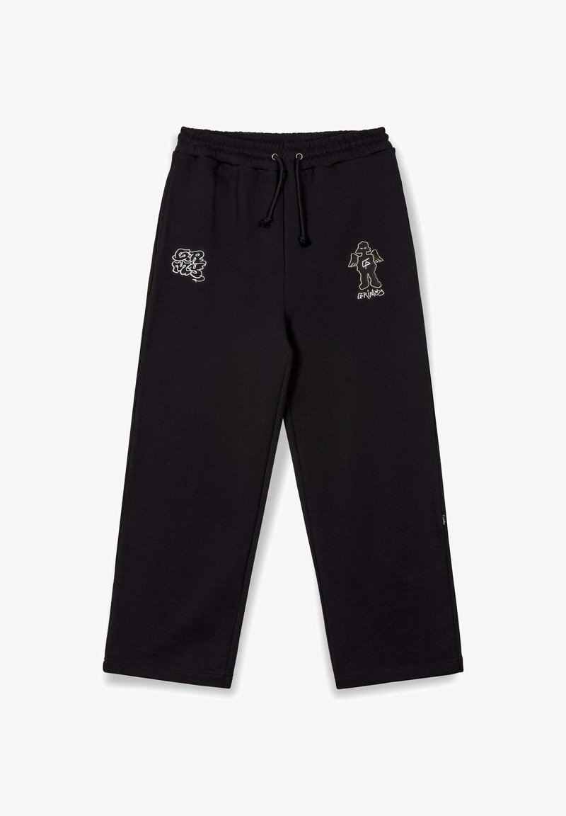 Zwarte sweatpants van zachte stof, met een elastische tailleband met trekkoord en twee witte grafische ontwerpen aan de voorkant.