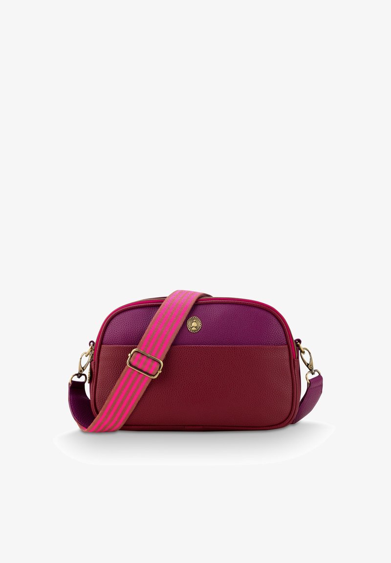 Compact crossbody bag in textured burgundy and purple leather, featuring a bold pink striped strap and a gold accent logo.
