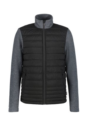 Zwarte gewatteerde vest met grijze gebreide mouwen. Bevat een hoge kraag en een ritssluiting aan de voorkant. Zijzakken zijn geïntegreerd in het ontwerp.