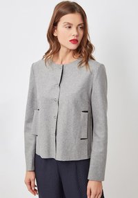 No seleccionado, gris