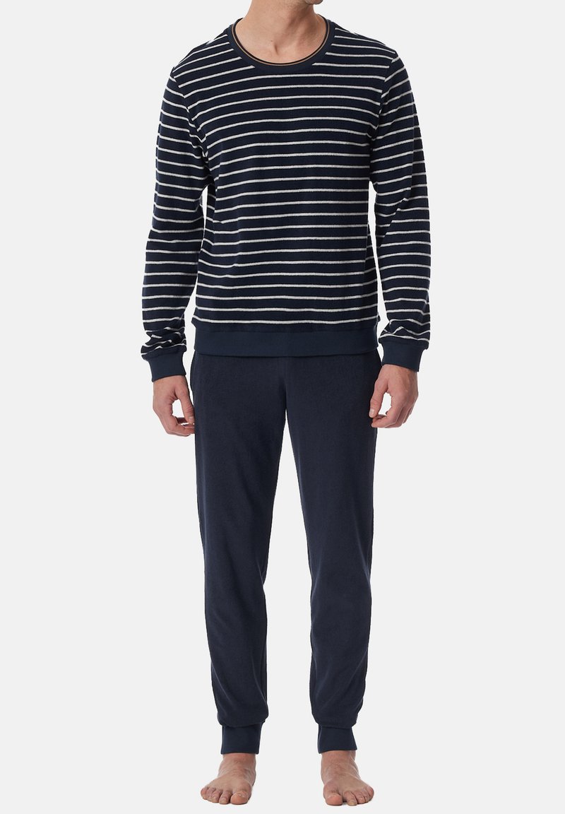 Navy striped long-sleeve top with white horizontal stripes, crew neck, and ribbed cuffs; paired with matching navy drawstring sweatpants.