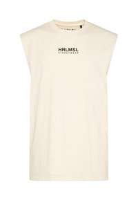 Cream sleeveless t-shirt made of cotton, featuring a round neckline and front print reading "HRLMSL STREETWEAR" in black.