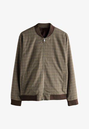 Jachetă bomber cu carouri maro, cu o textură netedă, fermoar în față, guler și manșete ribbed. Buzunare laterale integrate în design.