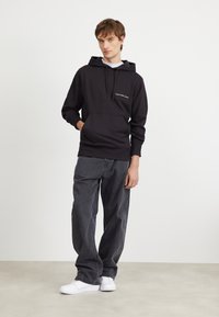 Calvin Klein Jeans INSTITUTIONAL HOODIE - Sweatshirt - black