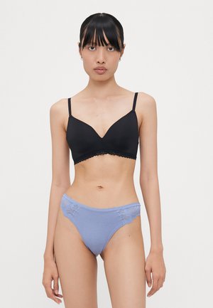 Black padded bra with adjustable straps; paired with light blue panties featuring lace accents on the sides. Smooth fabric texture.