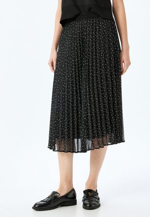 Falda acampanada - black
