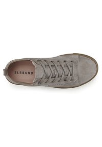 Gray suede sneaker with a smooth texture, round toe, and six eyelets. Features a brown rubber sole and embossed logo on the side.