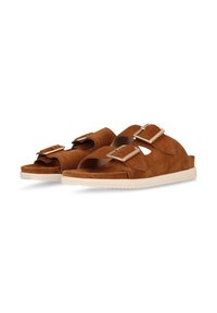 Brown suede sandals with two adjustable buckle straps, an open toe, and a white rubber sole featuring a textured tread pattern.