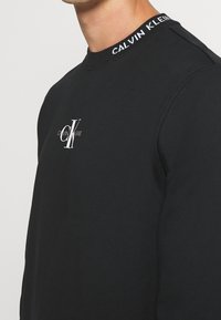 Calvin Klein Jeans Mikina - black