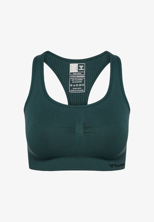Mørkegrøn sports-bh med et sømløst, struktureret design. Har brede stropper og et logo på den nederste kant. Lavet af polyamid og elastan.
