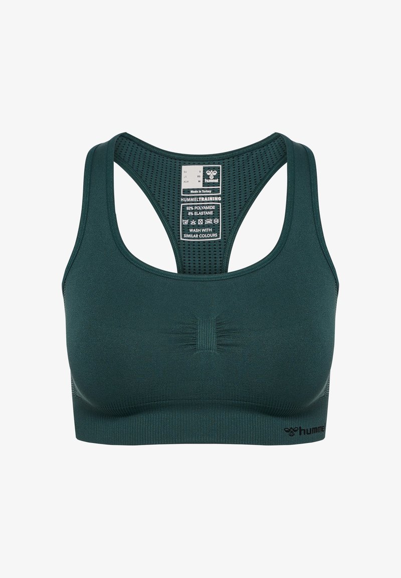 Ciemnozielony stanik sportowy o bezszwowym, teksturowanym designie. Posiada szerokie ramiączka i logo na dolnej taśmie. Wykonany z poliamidu i elastanu.