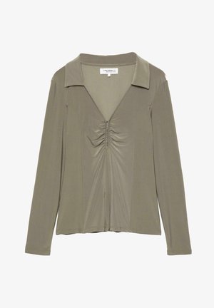 Olajzöld, hosszú ujjú felső, V-nyakkivágással és középen redőzött részletekkel, sima, rugalmas anyagból készült.