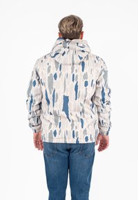 Lichte gewatteerde hoodie in een gepatterneerd ontwerp met tinten blauw, grijs en crèmekleurig. Het materiaal lijkt glad met elastische manchetten.