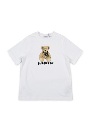 T-shirt bianco in cotone con una grafica di orso e testo "BURBERRY" in nero. Maniche corte, design classico a girocollo.