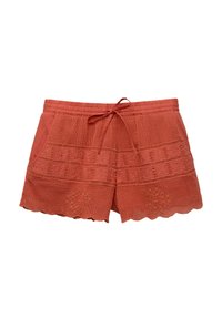 Shorts en dentelle couleur terre cuite avec un ourlet festonné, présentant des motifs brodés complexes et une taille élastique avec cordon de serrage.