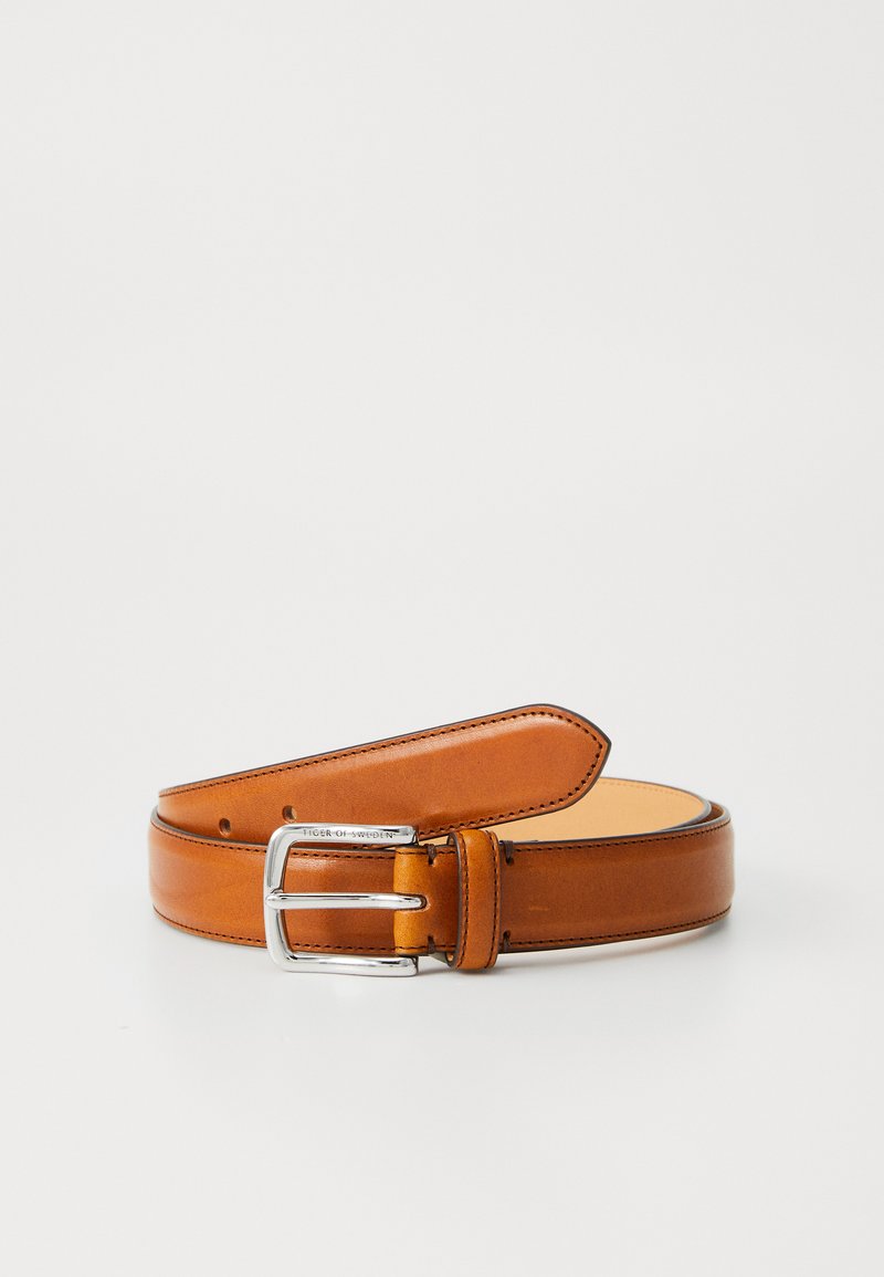 Brown leather belt with a shiny silver metal buckle. Smooth texture with finely stitched edges and a brand label on the strap.