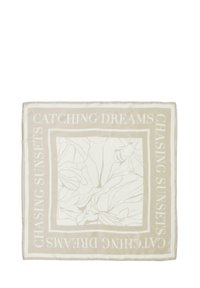 Écharpe en soie beige avec un design de contours floraux et le texte "ATTEINDRE DES RÊVES," "POURCHASSER DES COUCHERS DE SOLEIL," et "ATTEINDRE DES RÊVES" en blanc.