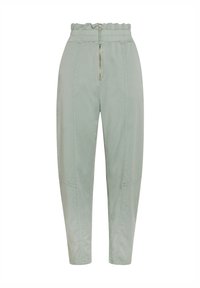 Lichtgroene tapered broek met een elastische tailleband, ritssluiting en zijnaaddetails. Zachte stof en een relaxte pasvorm.