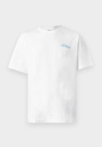 White cotton t-shirt with a crew neck, short sleeves, and light blue text reading "THE REGAL" on the left chest area.