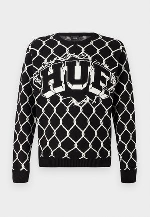 Schwarzer gestrickter Pullover mit einem weißen Diamantmuster und großem "HUF"-Logo in der Mitte. Rippbündchen und Saum runden das Design ab.