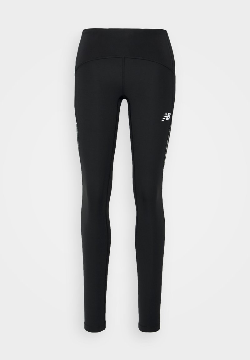 Leggings de sport noirs avec une taille haute, une texture lisse et un petit logo blanc sur le côté gauche. Conçus pour le sport.