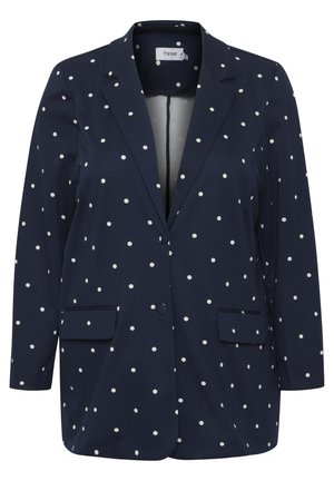 Blazer marine à pois blancs, manches longues, col cranté, deux poches avant, fermeture à un bouton, fabriqué dans un tissu lisse.