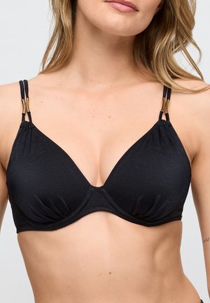 Zwarte driehoekige bralette met gevormde cups, geplooide details, verstelbare bandjes en goudkleurige hardware accenten. Gladde stoftextuur.