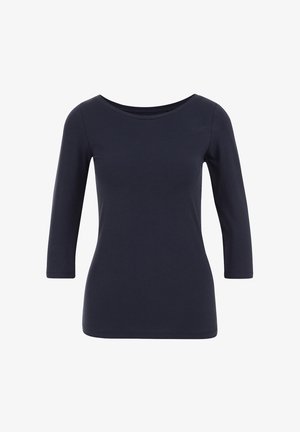 Haut en coton bleu marine à manches longues avec un décolleté large et une silhouette cintrée ; texture lisse avec un design simple, sans motifs ni accents.