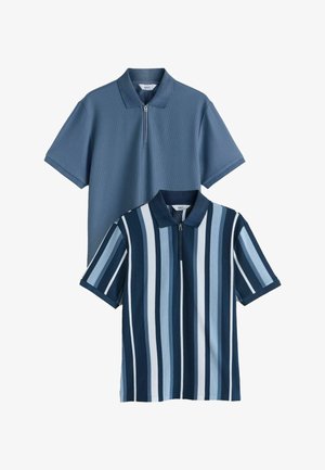 Two short-sleeve polo shirts in ribbed fabric, one solid blue and one with vertical blue and white stripes, both with front zippers.