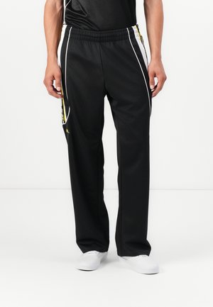 BANDA ARESTE KAPPA X 433 UNISEX - Treningo apatinė dalis - black/white/yellow