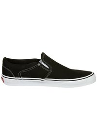 Scarpe slip-on nere in tela con suola in gomma bianca, cuciture a contrasto e pannelli elasticizzati sui lati. Design semplice, senza chiusure o lacci.