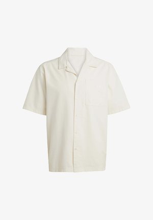 Koszula z krótkim rękawem w jasnym kremowym kolorze, wykonana z tkaniny tkanej. Posiada zapięcie na guziki z przodu, kołnierzyk oraz jedną kieszonkę na piersi z subtelnym logo.