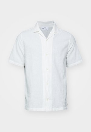 Κοντομάνικο πουκάμισο από λινό σε ανοιχτό λευκό χρώμα με γιακά, κουμπιά εμπρός και διακριτή υφή. Διαθέτει ευθεία στρίφωμα και αναδιπλωμένα μανίκια.