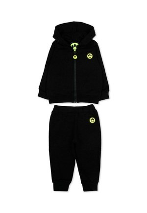 Survêtement pour tout-petit noir avec veste à capuche zippée et pantalon, décoré d'icônes de smiley vert néon sur la veste et le pantalon.