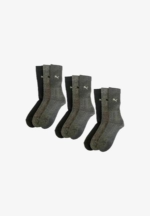 Three sets of black, dark gray, and light gray Puma crew socks arranged in pairs on a white background.