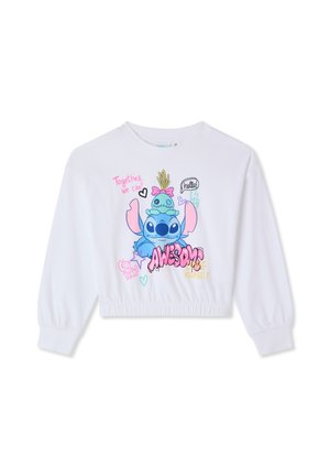 Felpa bianca corta con maniche lunghe, caratterizzata da una stampa colorata di un personaggio dei cartoni animati, testo ed elementi decorativi.
