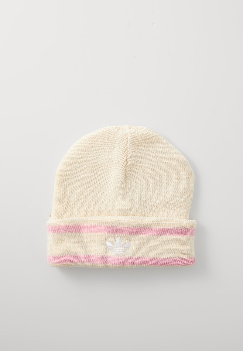 Cream-colored knitted beanie with a cuff, featuring pink stripes and a white embroidered logo at the front. Soft texture, casual design.