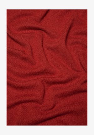 Roter gestrickter Stoff mit einer weichen, strukturierten Oberfläche, die sanfte Wellen und Falten zeigt. Das Material weist ein gleichmäßiges, mittelschweres Strickmuster auf.