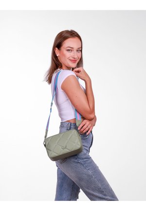 Light green synthetic crossbody bag with quilted texture, detachable rainbow strap, and rectangular shape. Accents include a logo detail.