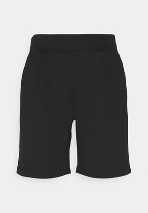 Pantaloncini neri fino al ginocchio con vita alta e cuciture frontali sottili, realizzati in un tessuto liscio.