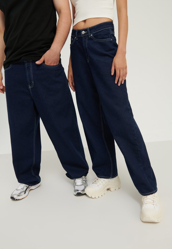 UNISEX - Baggy Jeans - rinsed denim