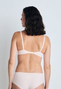 Simone Pérèle SAGA VOLLSCHALE  - Merevítős melltartó - pink nude
