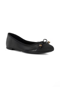 Black ballet flat made of smooth leather and fabric, featuring a rounded toe, bow accent with gold hardware, and a flat sole.