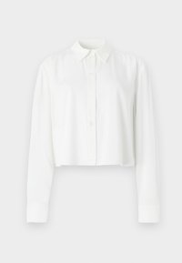 Cropped white long-sleeve shirt made of smooth fabric, featuring a classic collar and button-up front. Simple design with no patterns.