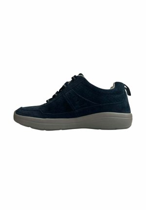 Zapato casual de ante negro con cordones negros y suela acolchada gris, mostrado de perfil sobre fondo blanco.