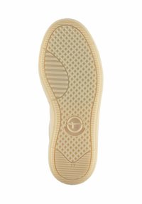 Shoe sole with beige rubber material, textured diamond pattern, striped grip areas, circular logo, and size number 37 visible.