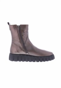 Metallic brown ankle boot with a side zipper, featuring a chunky black sole and smooth texture. Minimal stitching and pull tab at the back.