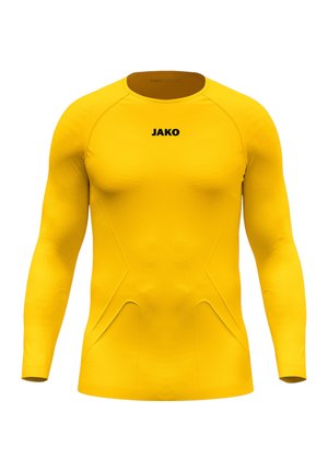 Maglia sportiva gialla a manica lunga con logo nero "JAKO" centrato sul petto, con design aderente e senza cuciture.