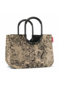 Sac fourre-tout beige avec imprimé botanique noir, poignées rondes en plastique noir, intérieur spacieux et base plate pour plus de stabilité.